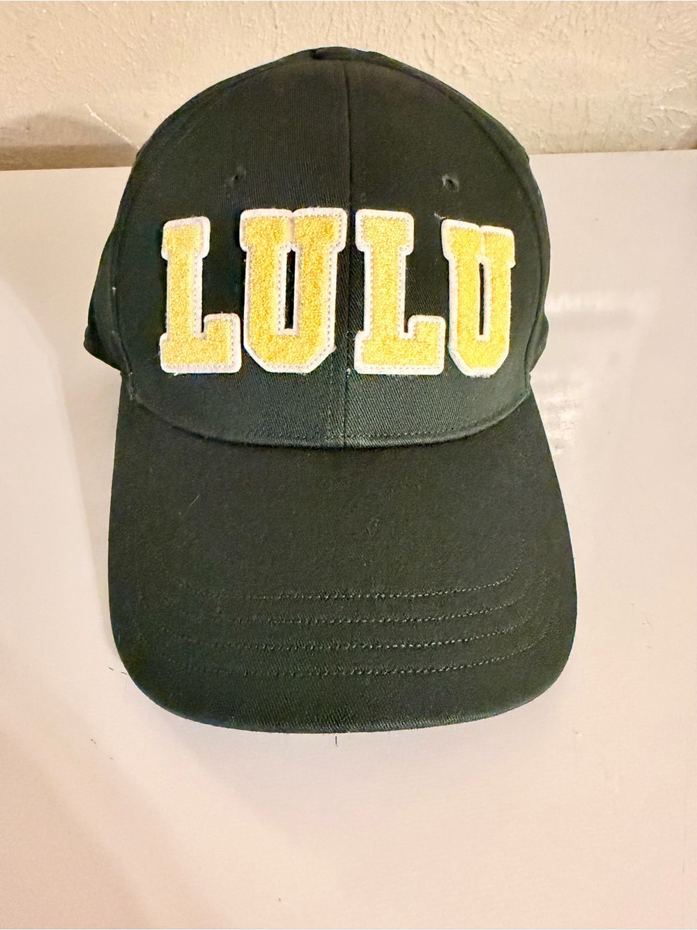 Lululemon dark green baseball cap